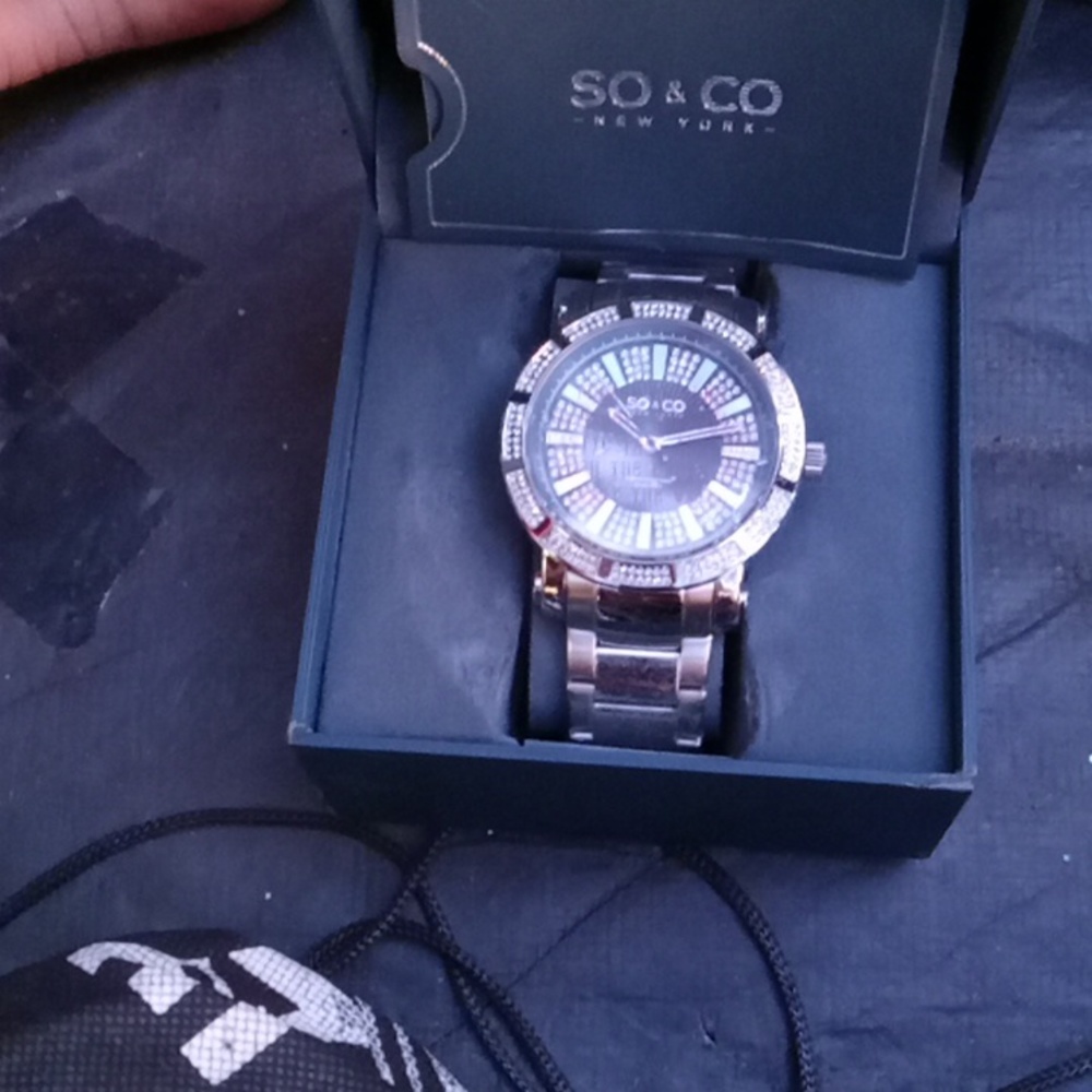 NY SO&CO Madison silver and chrome band with crystals embedded in the bezel.